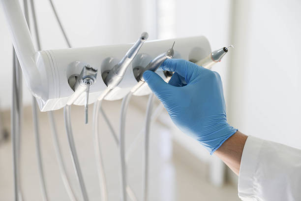 Professional Tooth Extraction technician working in Marion County County, SC